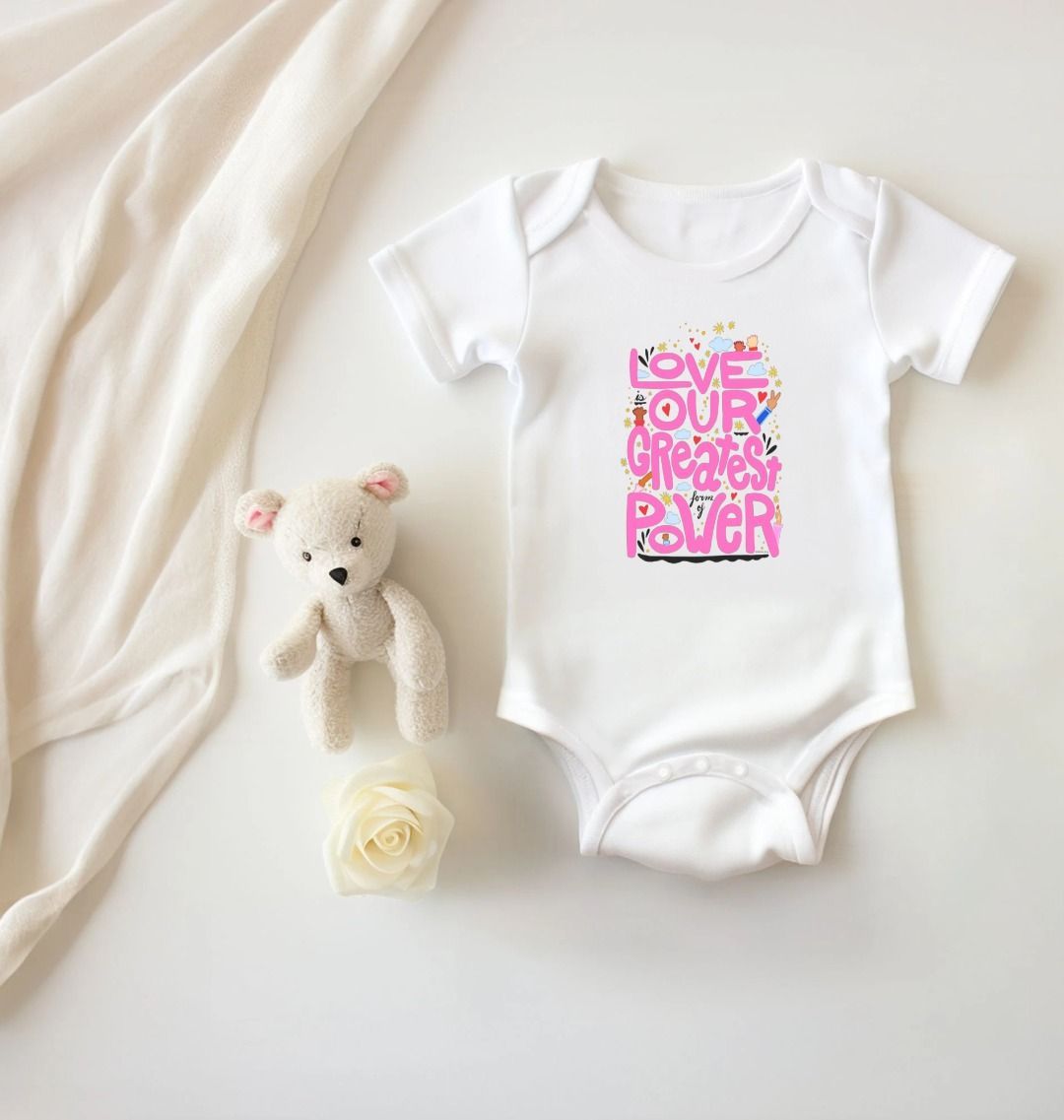 "Love is Our Greatest Form of Power" Organic Onesie (Baby - Pink Text)